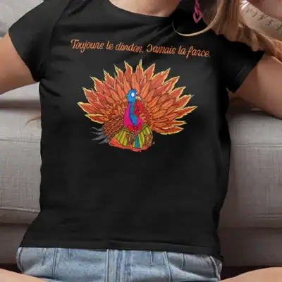 T-shirt femme noir humoristique illustration dindon coloré avec citation Toujours le dindon jamais la farce vêtement original décalé cadeau drôle coton confortable impression haute qualité