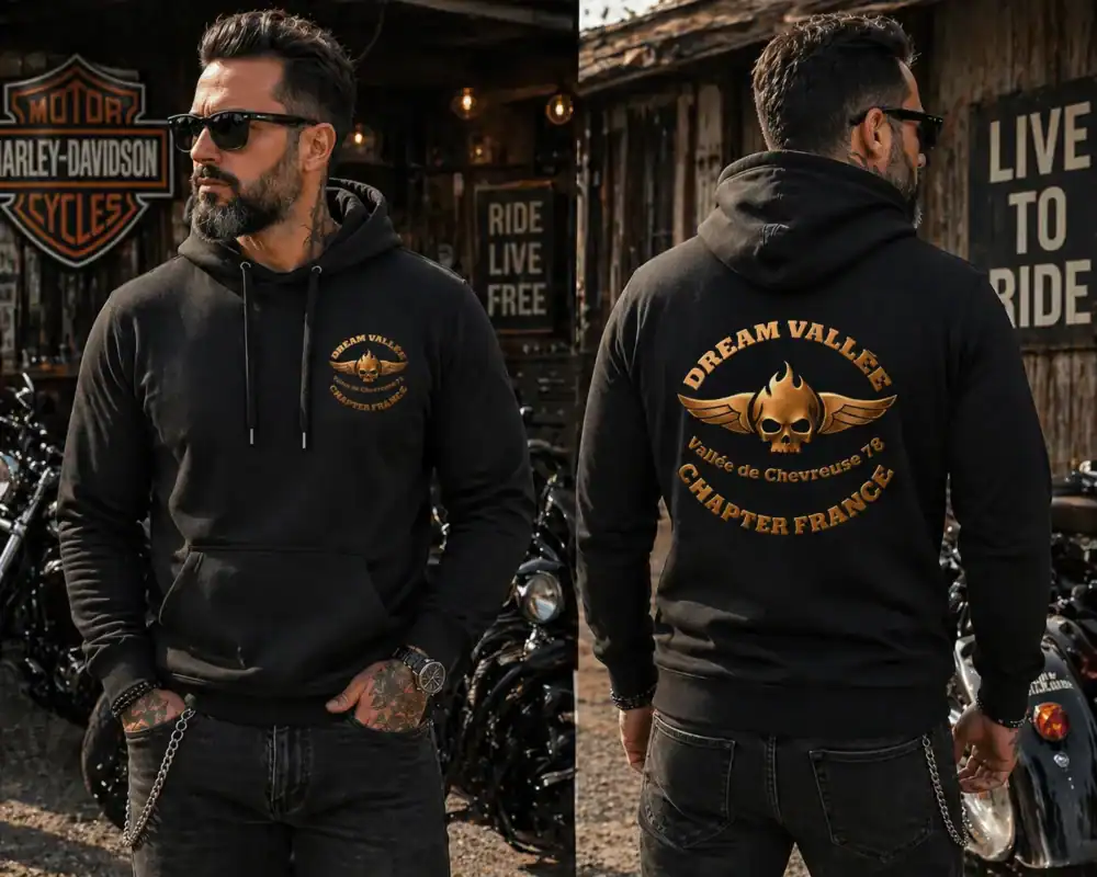 Sweat à capuche noir Dream Vallée Chapter France porté par homme style biker en garage moto vue face et dos