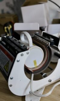 Imprimante à transfert thermique pour mug.