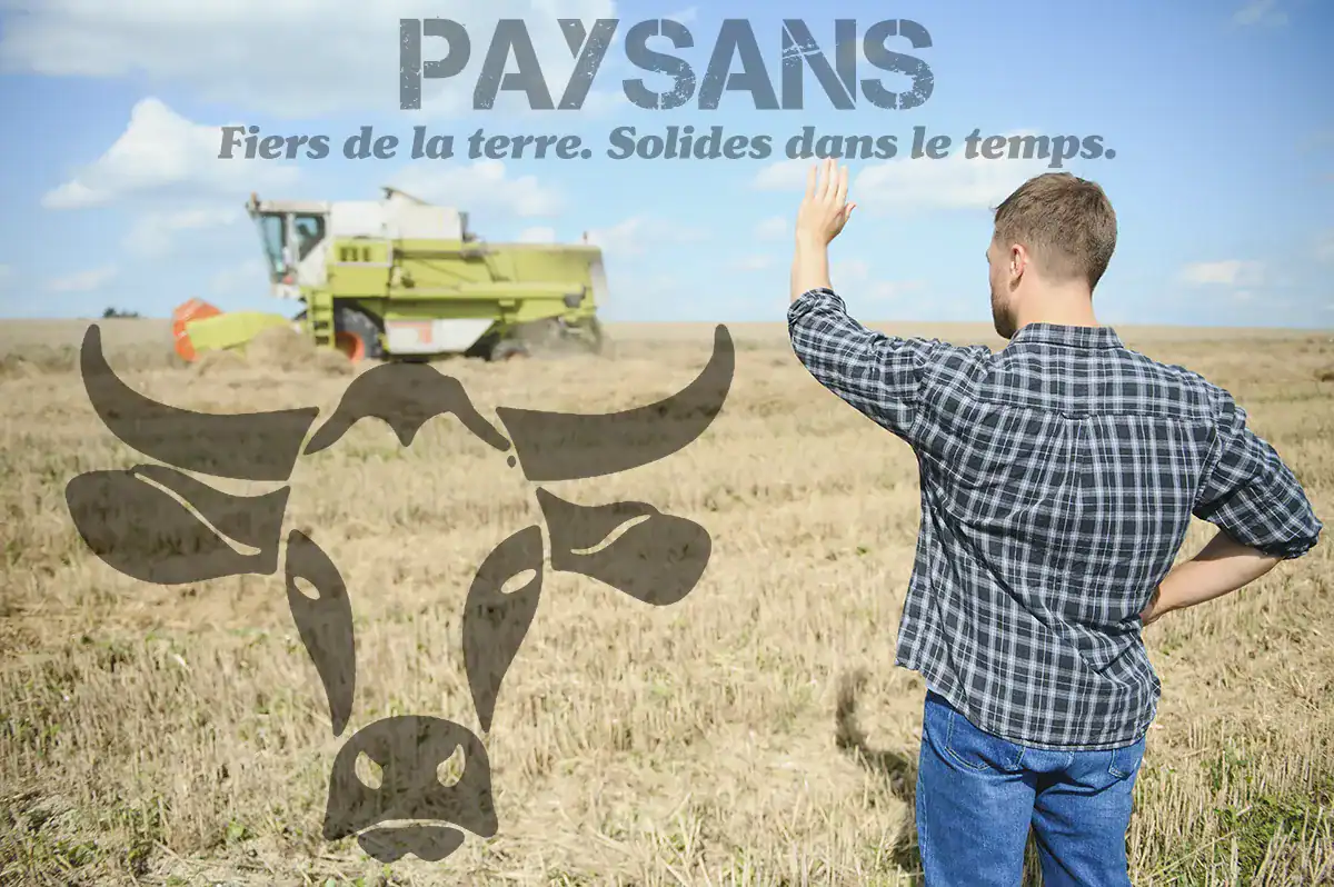 Paysan dans un champ après la récolte avec moissonneuse et slogan PAYSANS fiers de la terre solides dans le temps